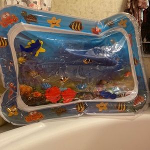 Tummy time water may